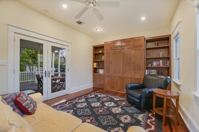 508 S Walnut St, Georgetown, TX 78626 - sitting room featuring french doors, baseboards, dark wood-style floors, ceiling fan, and recessed lighting