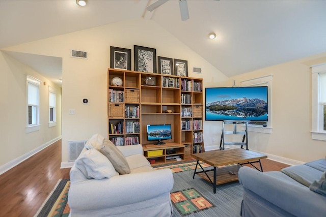 508 S Walnut St, Georgetown, TX 78626 - living room featuring baseboards, high vaulted ceiling, wood finished floors, beam ceiling, and ceiling fan