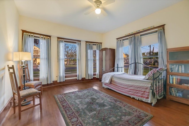 508 S Walnut St, Georgetown, TX 78626 - bedroom featuring multiple windows, wood finished floors, and ceiling fan