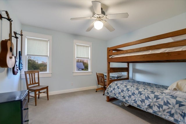 508 S Walnut St, Georgetown, TX 78626 - bedroom featuring multiple windows, light colored carpet, and baseboards