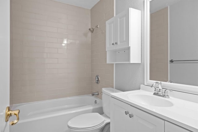 4902 Ganymede Dr, Austin, TX 78727 - full bathroom featuring toilet, a textured wall, shower / washtub combination, and vanity