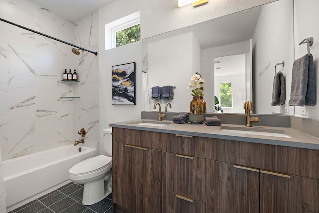 1713 E M Franklin Ave Unit 1, Austin, TX 78721 - full bathroom with double vanity, washtub / shower combination, and plenty of natural light