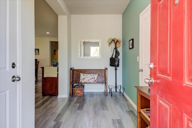 10312 Bankhead Dr, Austin, TX 78747 - foyer featuring wood finished floors, baseboards, and recessed lighting