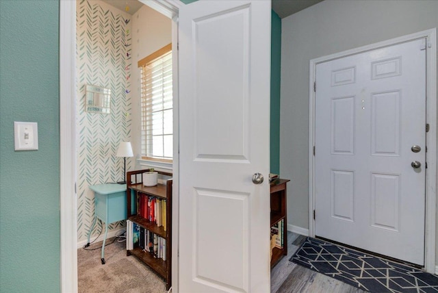 10312 Bankhead Dr, Austin, TX 78747 - foyer entrance with baseboards and a textured wall