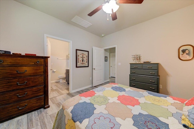 10312 Bankhead Dr, Austin, TX 78747 - bedroom featuring light wood-type flooring, ensuite bath, ceiling fan, and baseboards