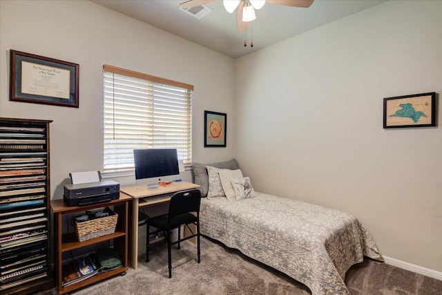 10312 Bankhead Dr, Austin, TX 78747 - carpeted bedroom featuring an office area, baseboards, and a ceiling fan