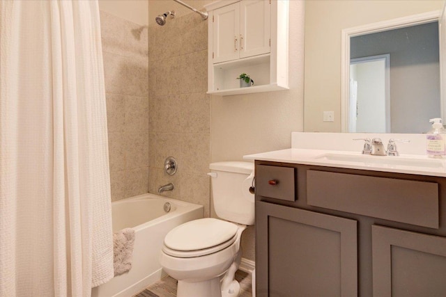 10312 Bankhead Dr, Austin, TX 78747 - full bath with toilet, shower / bath combo with shower curtain, vanity, and wood finished floors