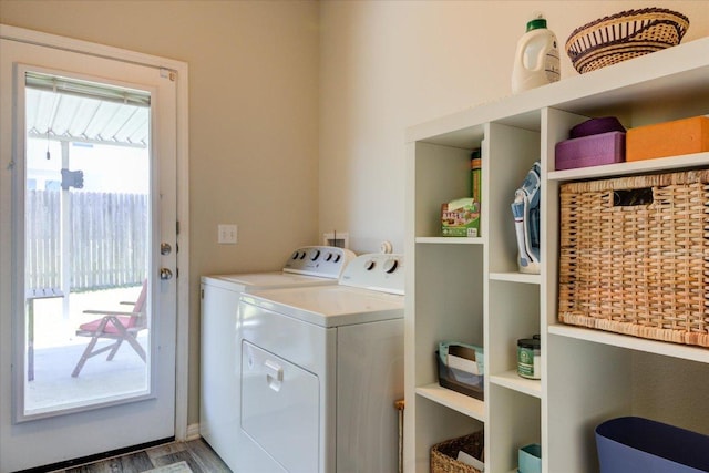 10312 Bankhead Dr, Austin, TX 78747 - laundry area featuring independent washer and dryer and wood finished floors