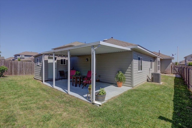 10312 Bankhead Dr, Austin, TX 78747 - rear view of property with a patio and central AC