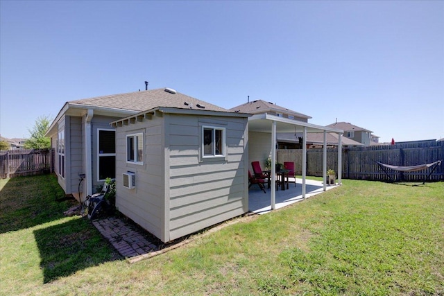 10312 Bankhead Dr, Austin, TX 78747 - rear view of house with a patio area and roof with shingles