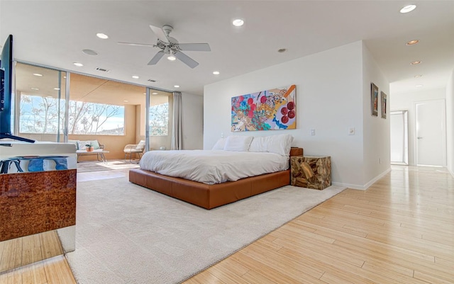 9707 Timber Ridge Pass, Austin, TX 78733 - bedroom featuring wood finished floors and recessed lighting