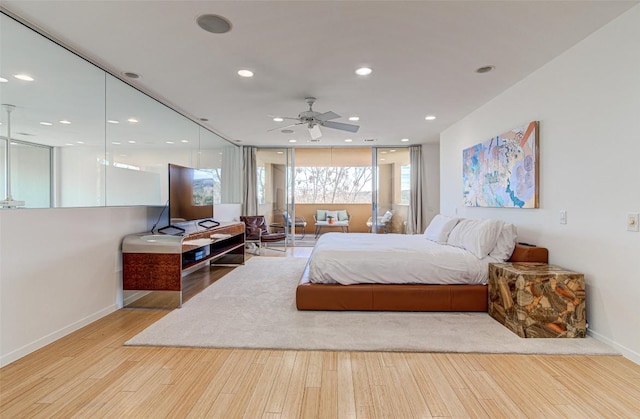 9707 Timber Ridge Pass, Austin, TX 78733 - bedroom featuring light wood-type flooring and recessed lighting