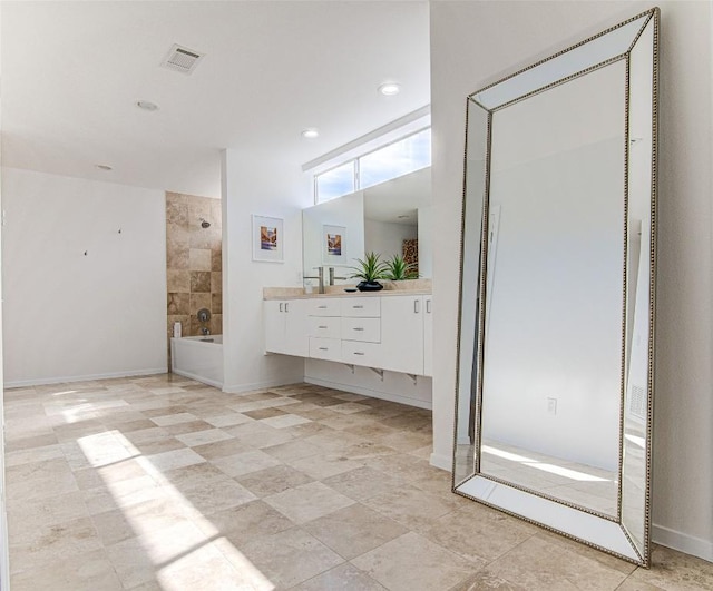 9707 Timber Ridge Pass, Austin, TX 78733 - full bathroom with vanity, washtub / shower combination, and recessed lighting