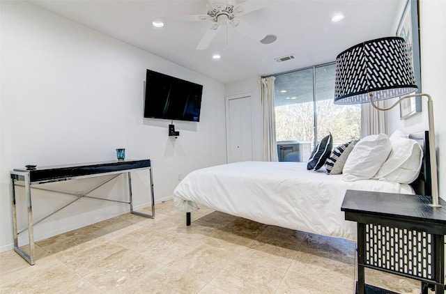 9707 Timber Ridge Pass, Austin, TX 78733 - bedroom featuring a ceiling fan and recessed lighting
