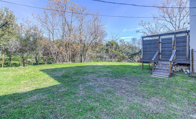 9707 Timber Ridge Pass, Austin, TX 78733 - view of grassy yard featuring a deck
