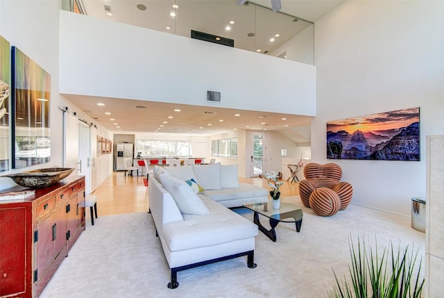 9707 Timber Ridge Pass, Austin, TX 78733 - living area featuring a high ceiling and recessed lighting