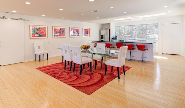 9707 Timber Ridge Pass, Austin, TX 78733 - dining room featuring recessed lighting and light wood finished floors