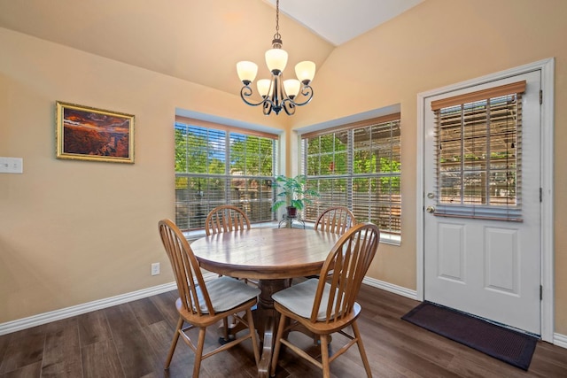 dining area featuring baseboards, dark wood-style flooring, vaulted ceiling, and an inviting chandelier