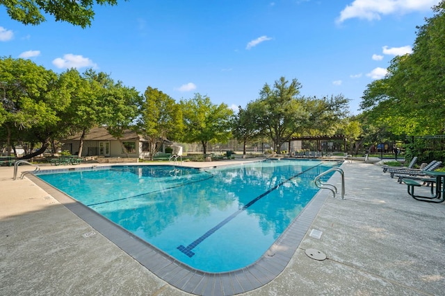 community pool with a patio