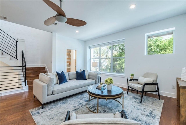 2608 E 6th St Unit 6, Austin, TX 78702 - living room with a ceiling fan, wood finished floors, a wealth of natural light, and stairway