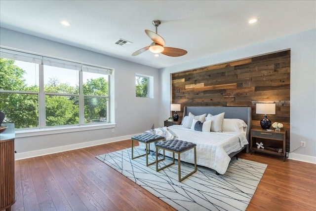 2608 E 6th St Unit 6, Austin, TX 78702 - bedroom featuring recessed lighting, wood finished floors, visible vents, and baseboards