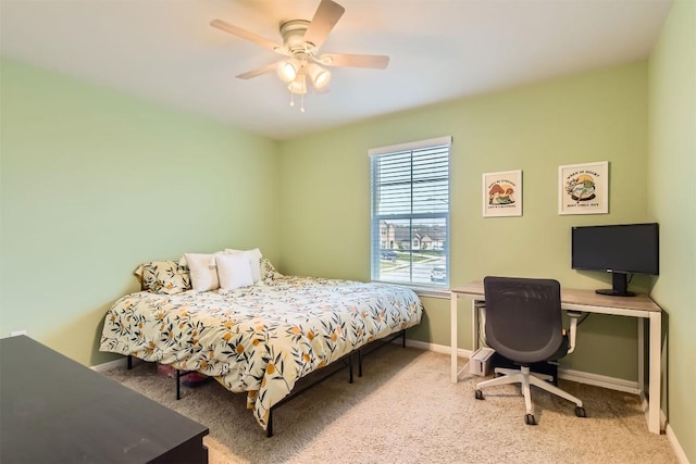 2232 Baugh Rd, Austin, TX 78754 - carpeted bedroom with baseboards, a ceiling fan, and an office area