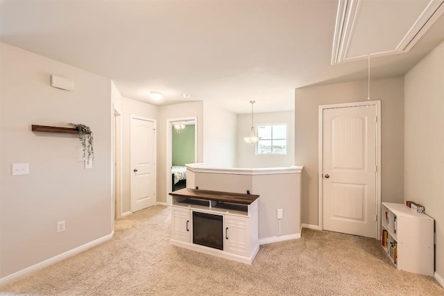 2232 Baugh Rd, Austin, TX 78754 - empty room featuring attic access, light colored carpet, and baseboards