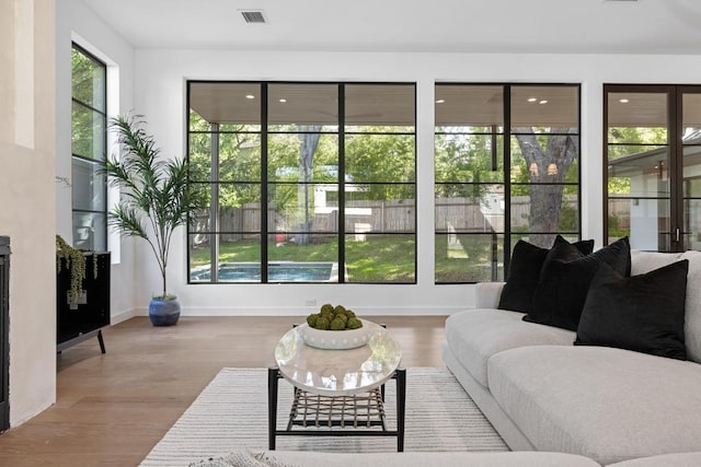 3412 Rosefinch Trl, Austin, TX 78746 - living area featuring wood finished floors and baseboards