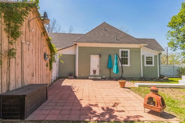 1132 W Clark St, Bartlett, TX 76511 - back of property featuring a patio and roof with shingles