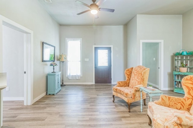 1132 W Clark St, Bartlett, TX 76511 - entrance foyer with light wood-style flooring, a ceiling fan, and baseboards