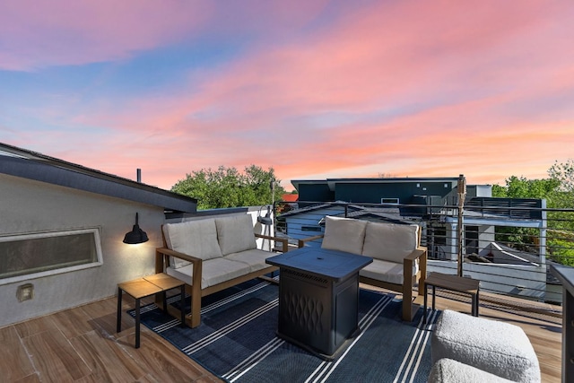 wooden deck featuring an outdoor living space