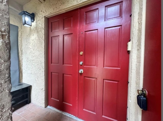 5918 Lago Vista Way Unit D32, Leander, TX 78645 - doorway to property with stucco siding