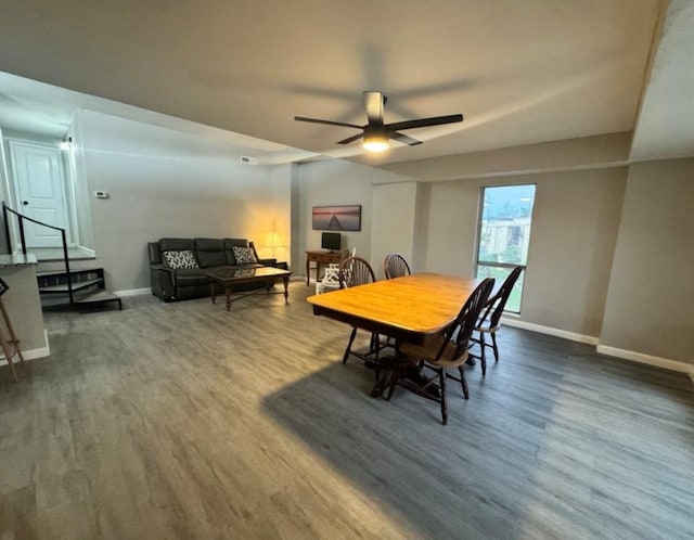 5918 Lago Vista Way Unit D32, Leander, TX 78645 - dining space featuring baseboards, ceiling fan, and wood finished floors