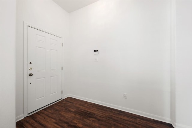 18513 Silent Water Way, Pflugerville, TX 78660 - foyer with dark wood-style floors and baseboards