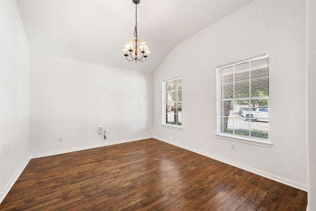 18513 Silent Water Way, Pflugerville, TX 78660 - spare room with a chandelier, vaulted ceiling, and dark wood finished floors