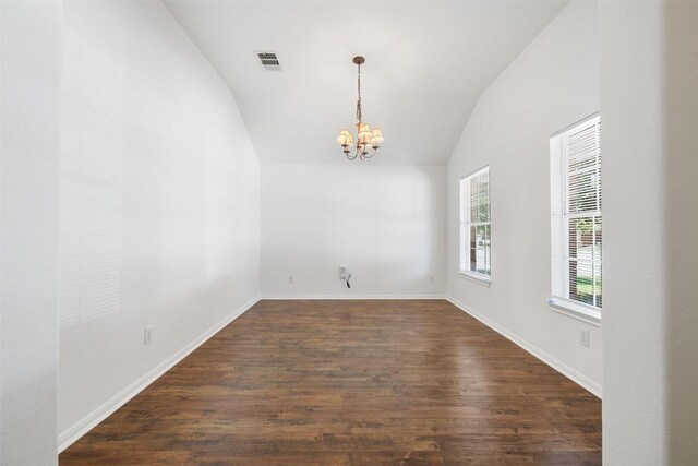 18513 Silent Water Way, Pflugerville, TX 78660 - spare room featuring a chandelier, lofted ceiling, and dark wood-style floors
