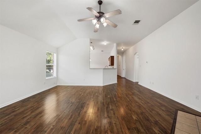 18513 Silent Water Way, Pflugerville, TX 78660 - unfurnished living room featuring a ceiling fan, dark wood-style floors, arched walkways, and lofted ceiling