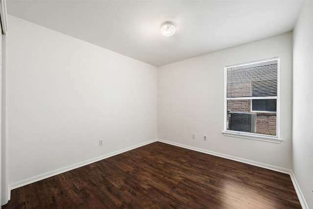 18513 Silent Water Way, Pflugerville, TX 78660 - spare room with dark wood-type flooring