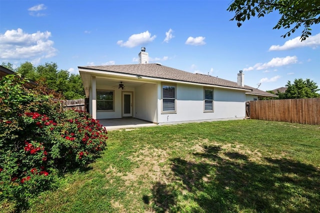 18513 Silent Water Way, Pflugerville, TX 78660 - rear view of property featuring ceiling fan, a fenced backyard, a patio, and a chimney