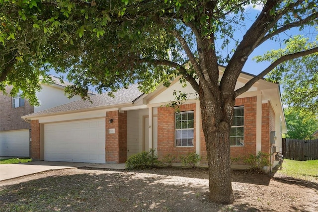 18513 Silent Water Way, Pflugerville, TX 78660 - ranch-style house with brick siding, driveway, and an attached garage