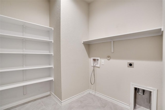 washroom with laundry area, washer hookup, gas dryer hookup, baseboards, and hookup for an electric dryer