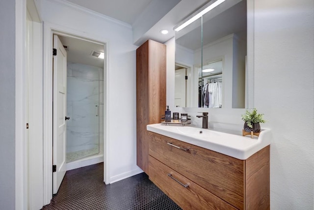 full bathroom with visible vents, ornamental molding, a shower stall, vanity, and tile patterned flooring