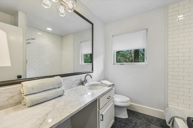 201 Westwood Ter, West Lake Hills, TX 78746 - full bathroom featuring vanity, toilet, baseboards, and a tile shower