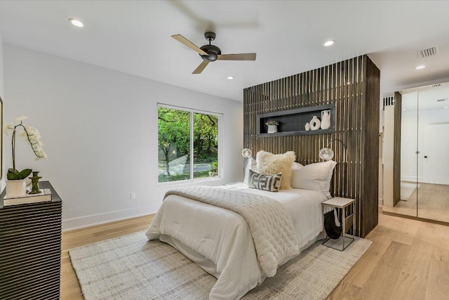 201 Westwood Ter, West Lake Hills, TX 78746 - bedroom featuring a ceiling fan, recessed lighting, baseboards, visible vents, and wood finished floors
