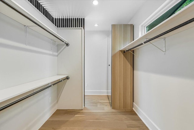 201 Westwood Ter, West Lake Hills, TX 78746 - spacious closet with light wood finished floors