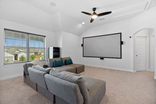 cinema featuring baseboards, visible vents, ceiling fan, and light colored carpet