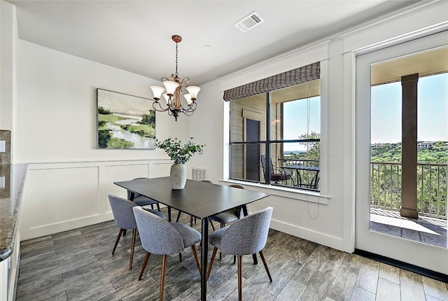 17808 Maritime Dr Unit 202, Jonestown, TX 78645 - dining room with a chandelier and wood finished floors