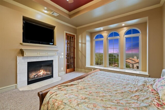 11913 Preserve Vista Ter, Austin, TX 78738 - bedroom featuring carpet, crown molding, a fireplace, baseboards, and ceiling fan