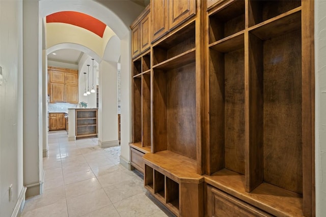 11913 Preserve Vista Ter, Austin, TX 78738 - mudroom featuring a sauna, arched walkways, baseboards, and light tile patterned floors