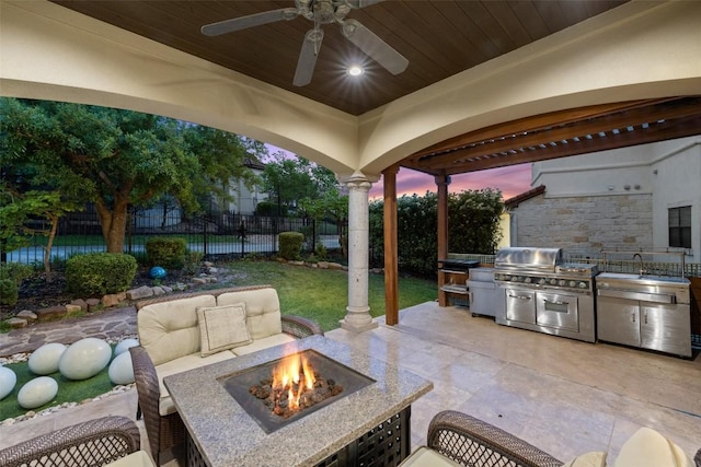 11913 Preserve Vista Ter, Austin, TX 78738 - fenced backyard with a patio area, a ceiling fan, and a fire pit